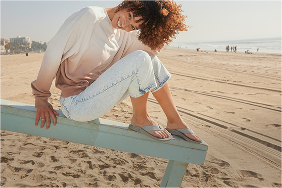 Rocking classic flips on an beach adventure.