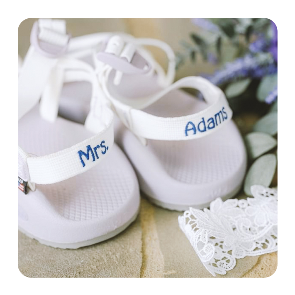 Embroidered Mrs. Adams on the strap of a pair of Chacos.